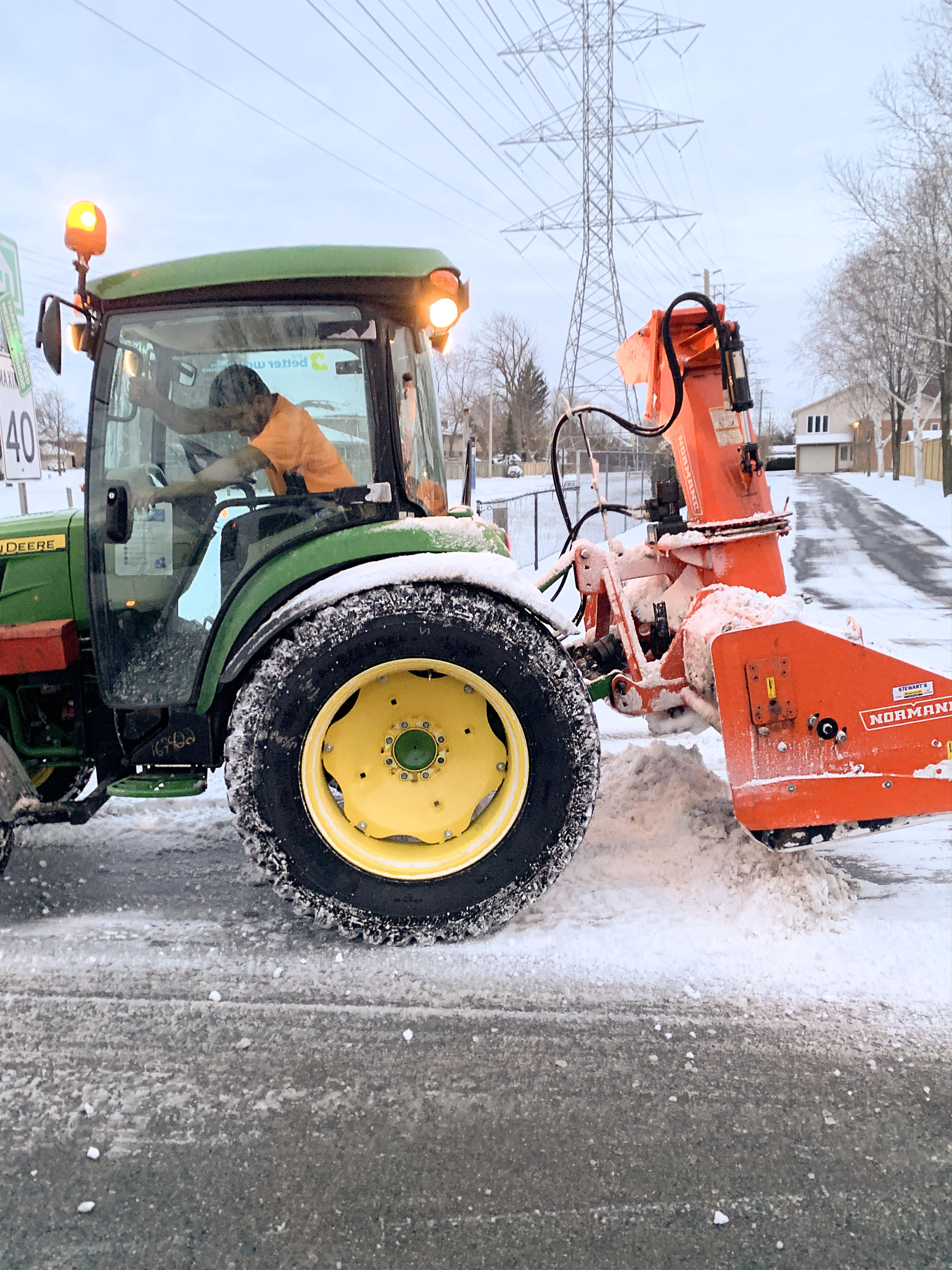 Tractor removing snow